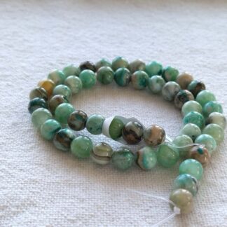 8 mm aragonit ásványgyöngy szálban