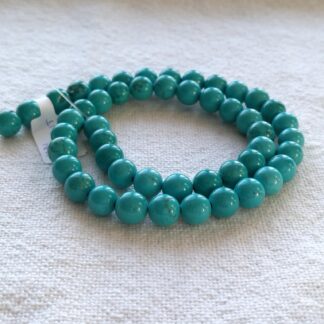 8 mm magnezit szinezett ásványgyöngy szálban