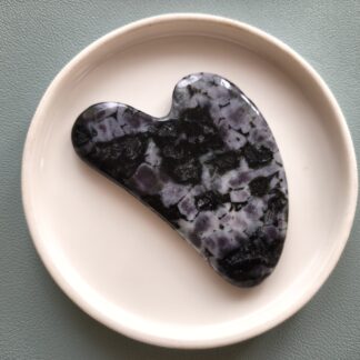 Gua sha arcmasszírozó indiai gabbro